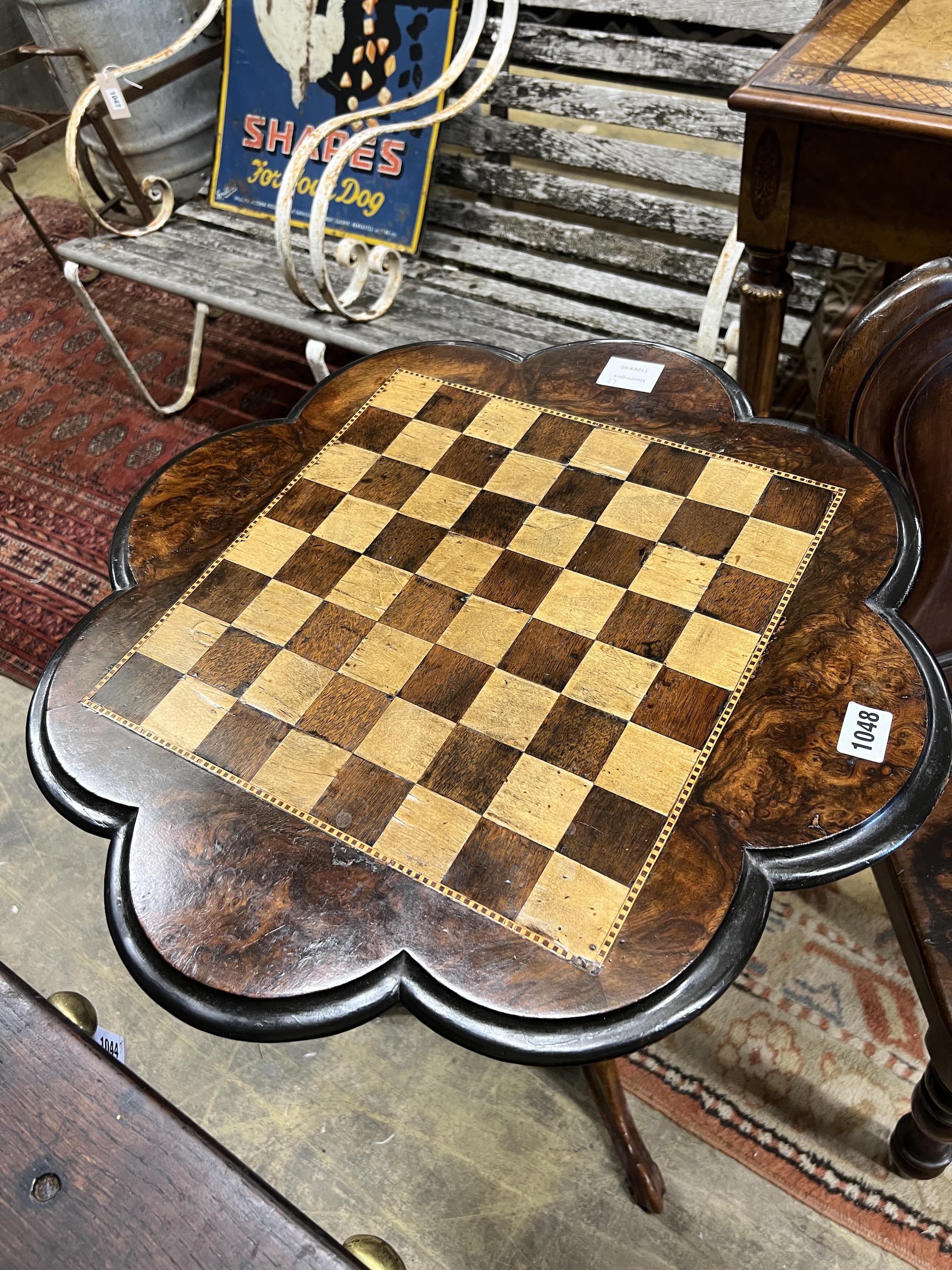 A Victorian mahogany hall chair and a Victorian walnut tripod games table, width 56cm, height 73cm